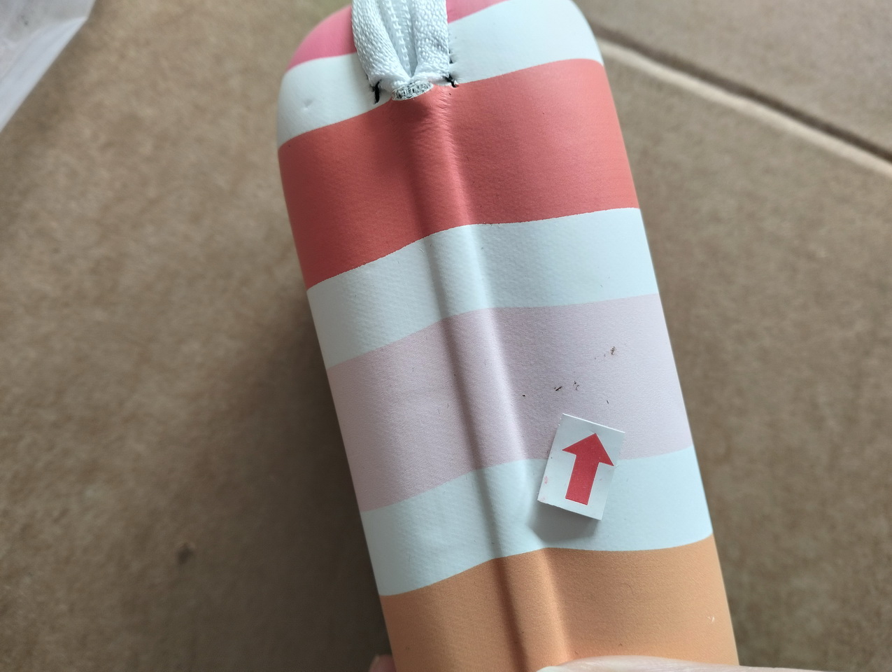Defect photo with red arrow marking a further workmanship issue